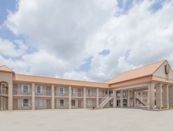 Motel Super 8 By Wyndham New Iberia Esterno foto